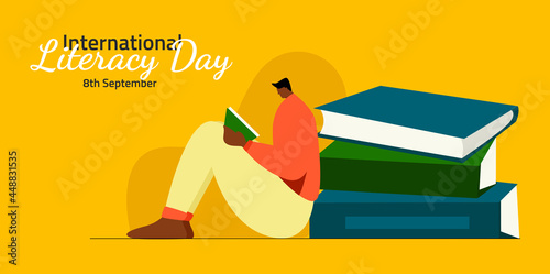 Boy reading book, International literacy day concept