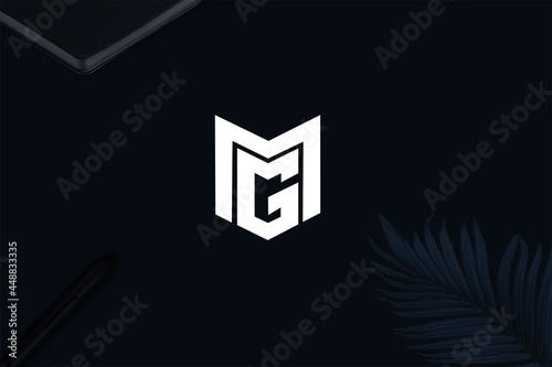 Professional and Minimalist Letter MG Logo Design, Editable in Vector Format in Black and White background  Color
