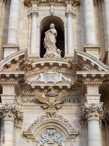 Cathedral of Syracuse facade detail with Virgin Mary statue
