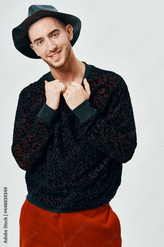 man in black sweater red pants posing studio self-confidence man in black sweater red pants posing studio self-confidence