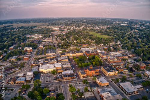 Fototapeta Aerial View of Downtown Woodstock, Illinois during Summer Twilight