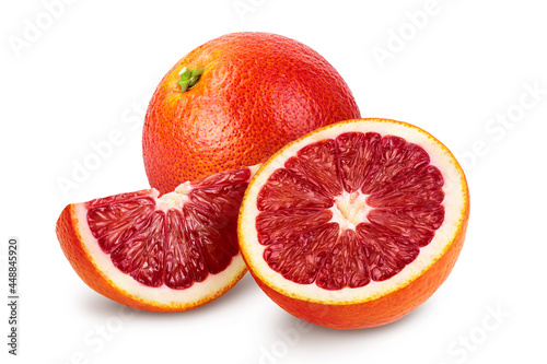 Blood red oranges half and slice isolated on white background with clipping path and full depth of field