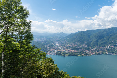 Beautiful view over Lake Como and the city of Tavernola, Lombardy, Italy. The view is seen from the small village of Brunate, above the city of Como. It is a sunny, summer day