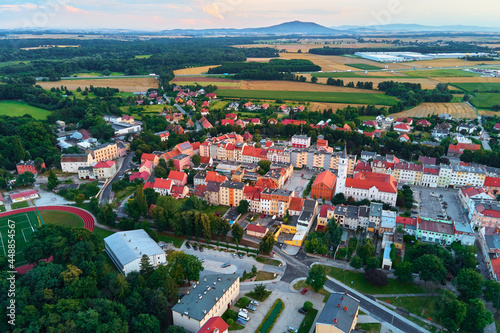Fototapeta Naklejka Na Ścianę i Meble -  Small town in Europe, aerial view. Residential buildings and streets in small city