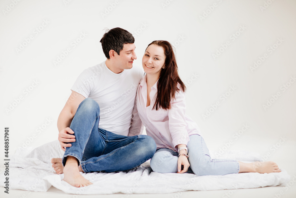 couple man and woman in white photo studio. family psychotherapy. couple man and woman in white photo studio. family psychotherapy.