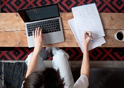 Young woman study at home photo