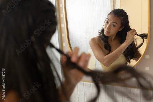 woman opening her braids photo