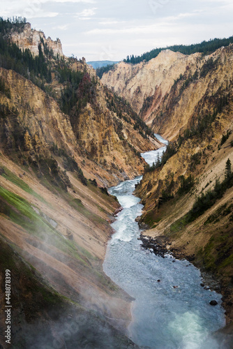 River running through a valley in Yellowstone National Park. 