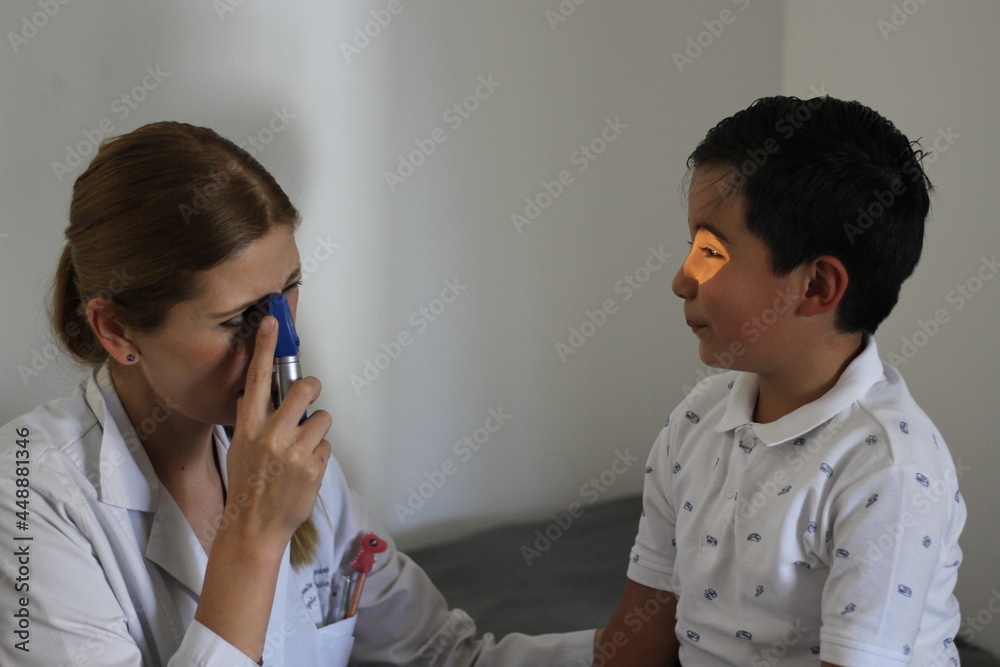 Female professional pediatrician doctor working checking a happy latin child
Female professional pediatrician doctor working checking a happy latin child