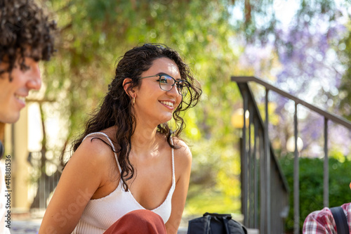 Woman Sits with Group of Friends