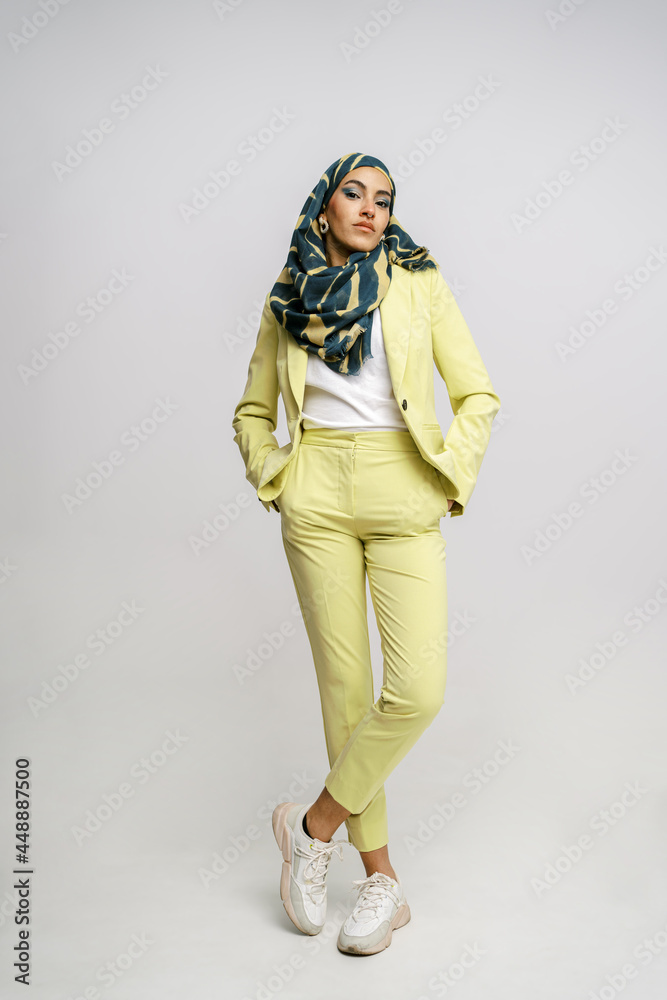 Elegant muslim female model in stylish suit and hijab Elegant muslim female model in stylish suit and hijab