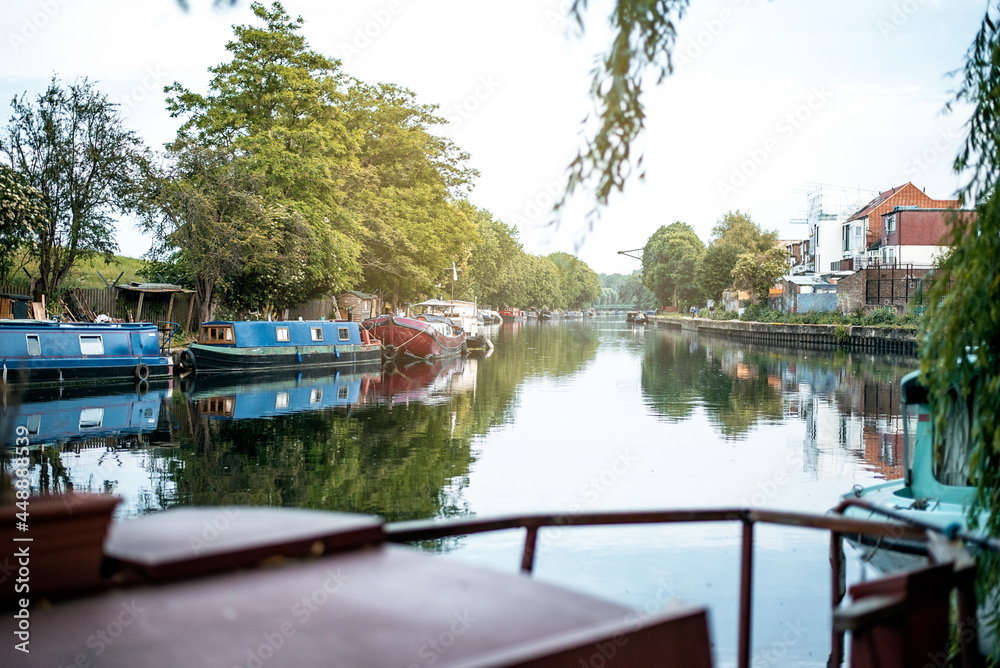Houseboats in a canal river in London Houseboats in a canal river in London