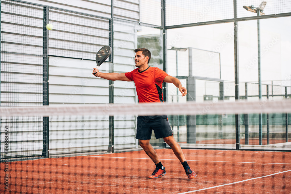 Man playing padel Man playing padel