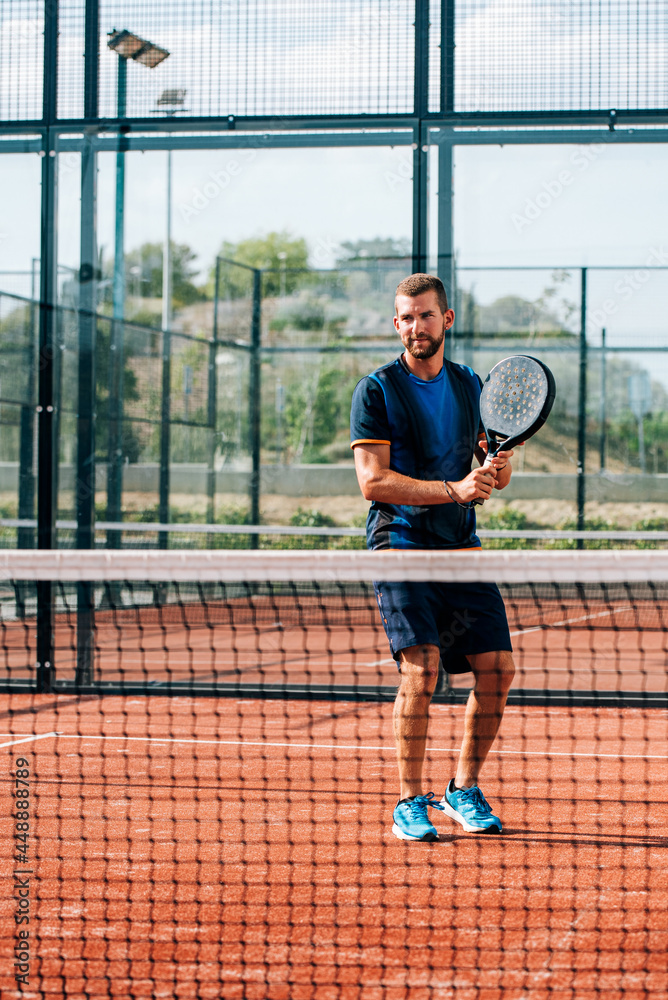 Man playing padel Man playing padel