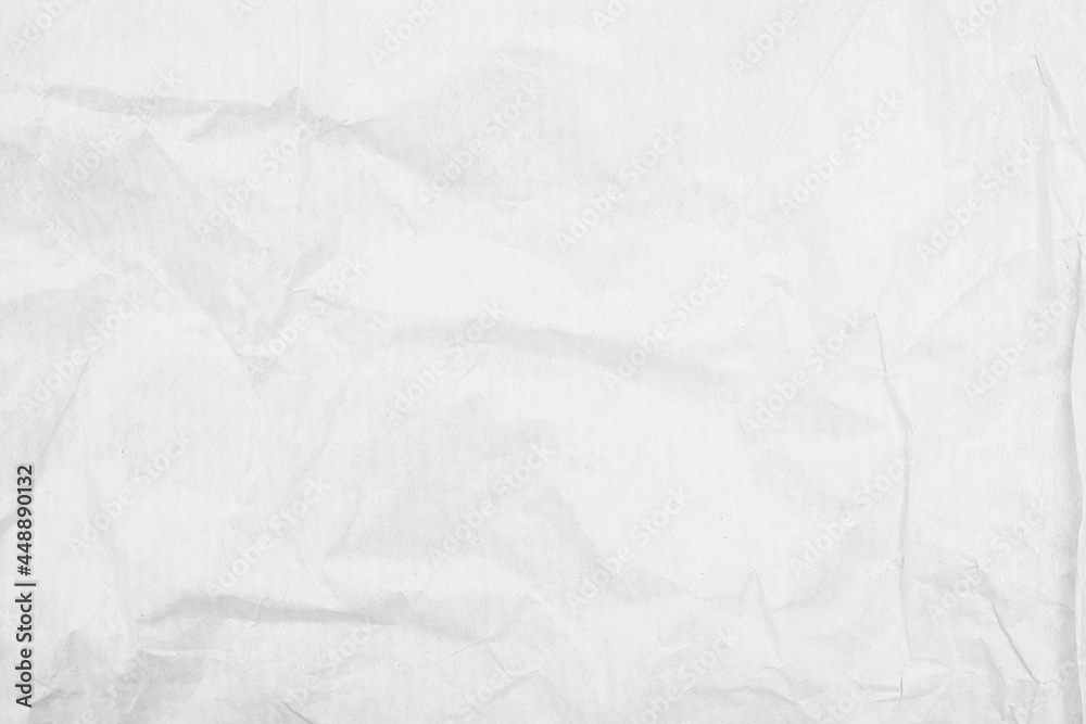 Fototapeta premium White recycled craft paper texture as background. Grey paper texture, Old vintage page or grunge vignette of old newspaper. 
