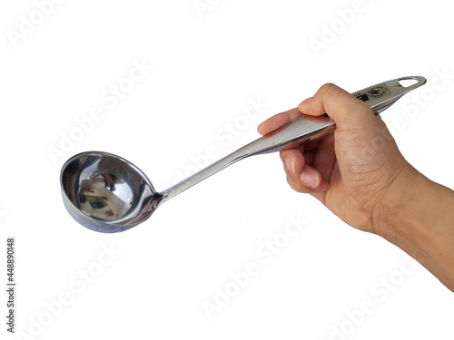 men's hand holding stainless steel ladle isolated on white background