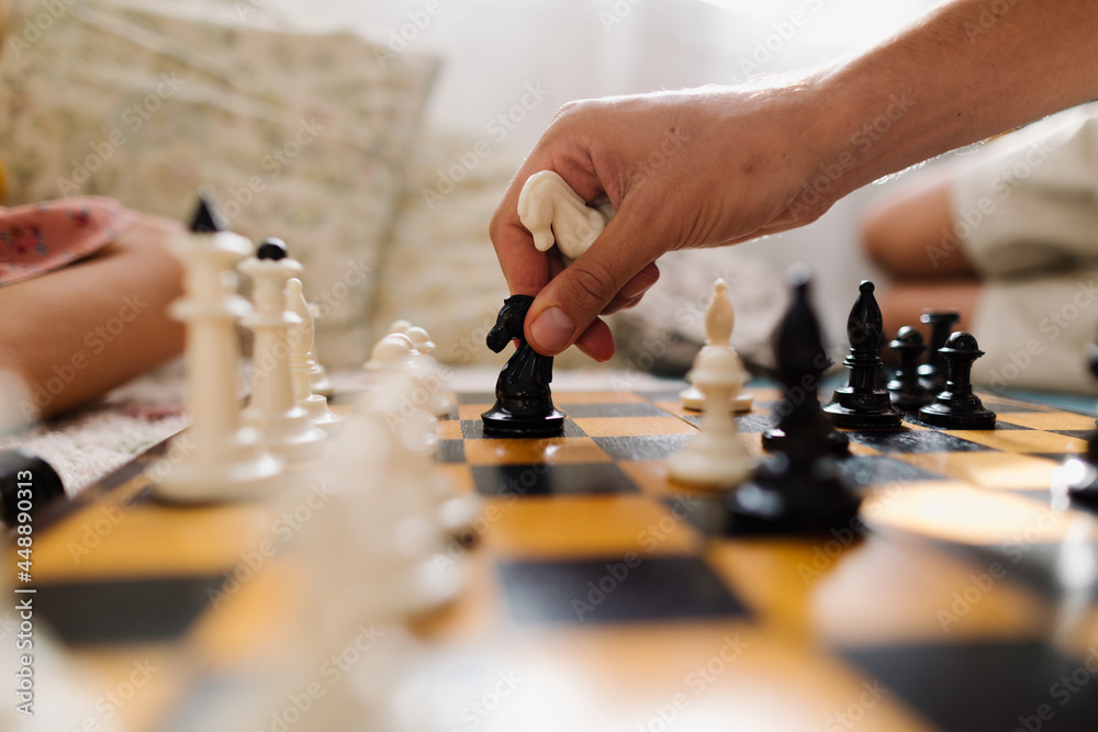 A chess board. Father plays with daughter A chess board. Father plays with daughter