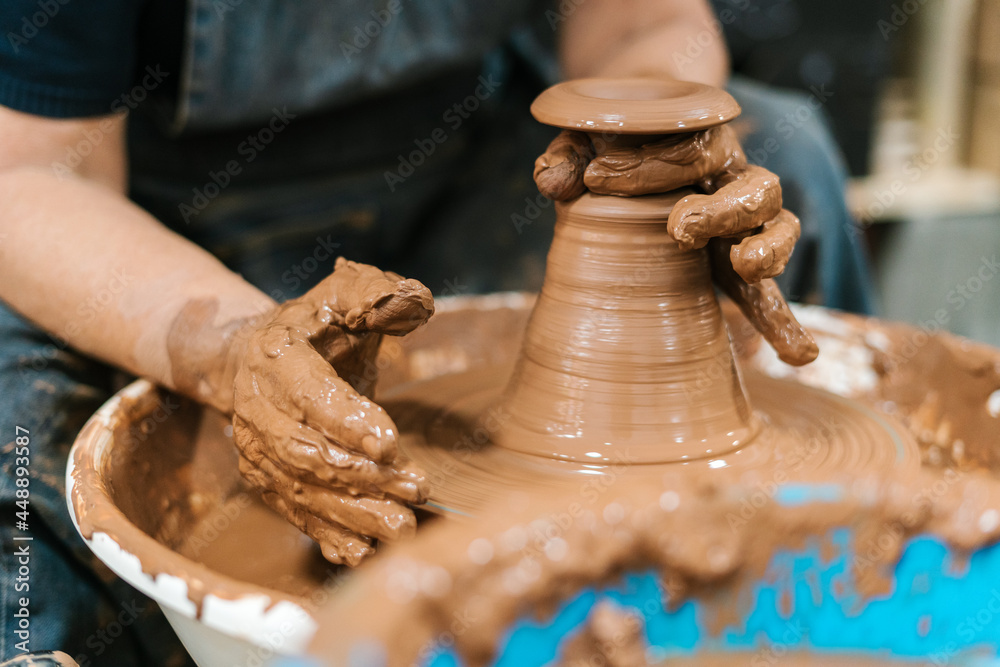 Anonymous clay-stained artisan brothers Anonymous clay-stained artisan brothers