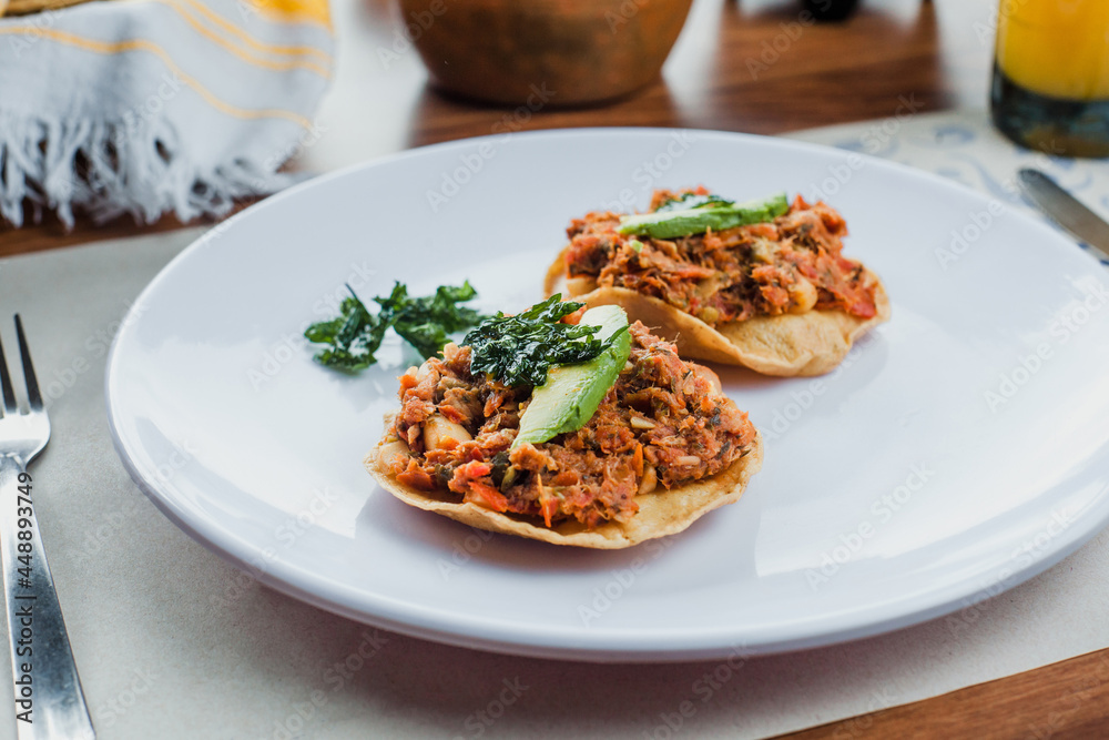 Mexican tostadas with cod, typical food of Mexico City Mexican tostadas with cod, typical food of Mexico City