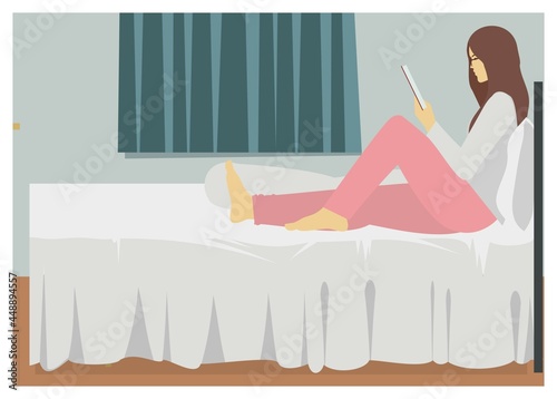 Young lady reading in the bedroom