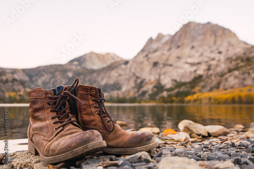 Pair of old boots in a lake photo
