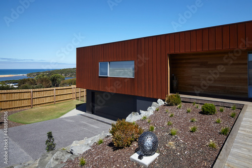 Large coastal luxury home with Corten Steel cladding photo