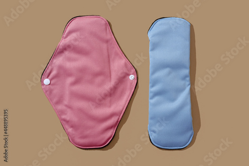 unfolded and folpink and blue cloth menstrual padsded cloth mens