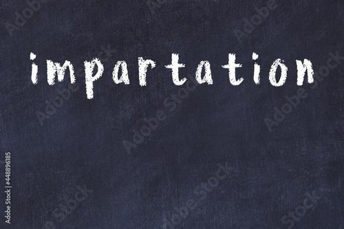 College chalk desk with the word impartation written on in