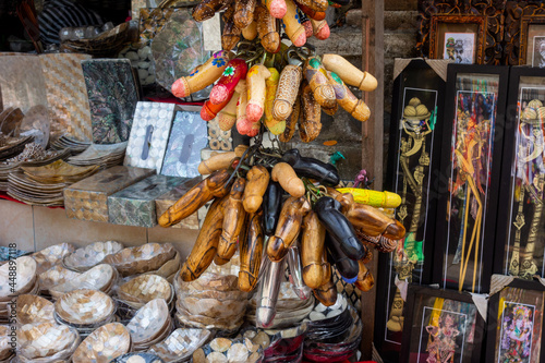 Εκτύπωση καμβά Traditional Balinese souvenirs and wooden decorated Phallus in a street market o
