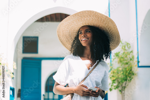 Black woman with with a mobile phone