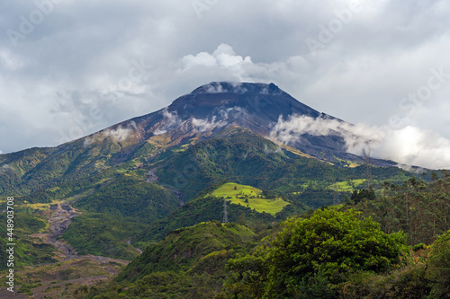Tungurahua volcano with steam volcanic activity and dramatic clouds  Banos  Ecuador.
