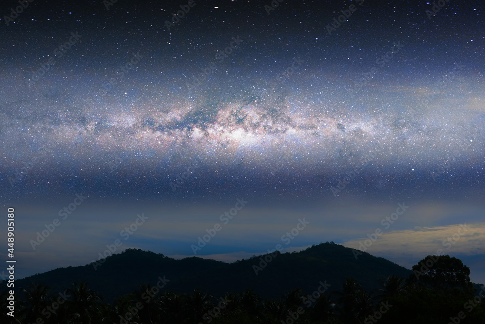 Milky way night landscape light over silhouette mountain