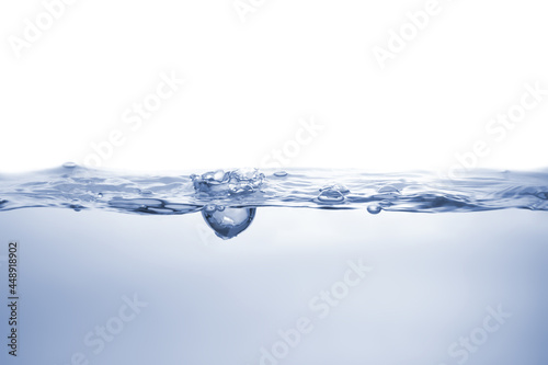 Water splash Aqua flowing in waves and creating bubbles Drops on the water surface feel fresh and clean isolated on white background.