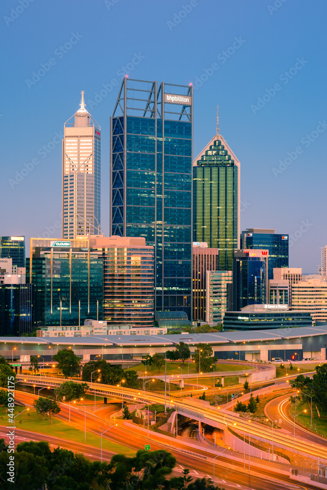 Downtown Perth city and the Mitchell Freeway viewed at sunset from Kings Park. Perth is a modern and vibrant city and is the state capital of Western Australia, Australia.