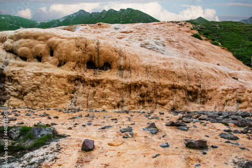 Georgia. Mineral spring - water flows down a travertine rock.