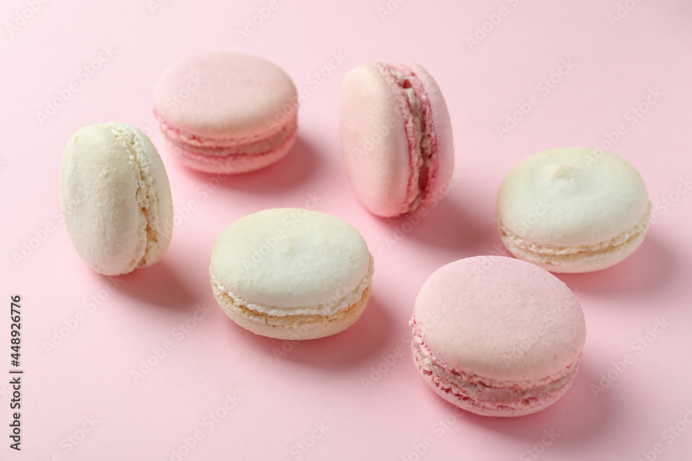 Concept of tasty dessert with macaroons on pink background Concept of tasty dessert with macaroons on pink background