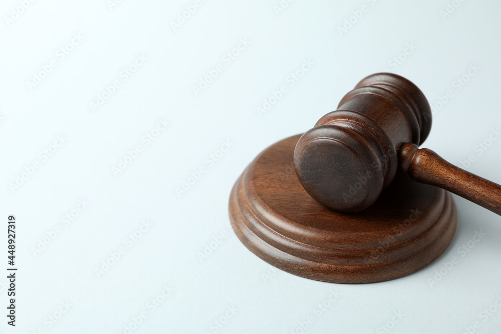 Wooden judge gavel on white background, close up