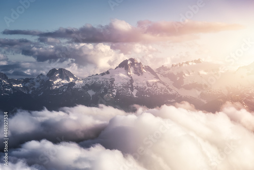 Aerial View from Airplane of Canadian Mountain Landscape, Tantalus Range. Sunny Sunset Art Render. Taken between Squamish and Whistler, North of Vancouver, BC, Canada.