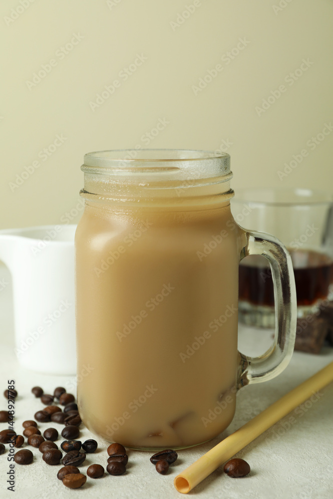 Concept of delicious drink with Irish coffee on white textured table Concept of delicious drink with Irish coffee on white textured table