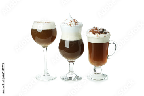 Glasses of Irish coffee isolated on white background