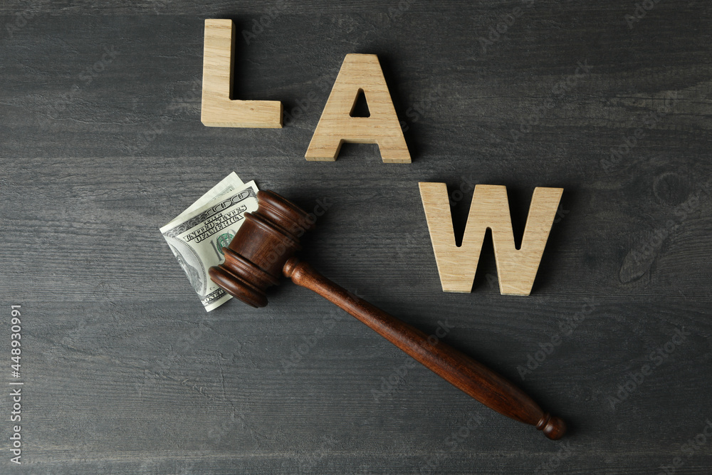 Law concept with judge gavel on dark wooden table Law concept with judge gavel on dark wooden table