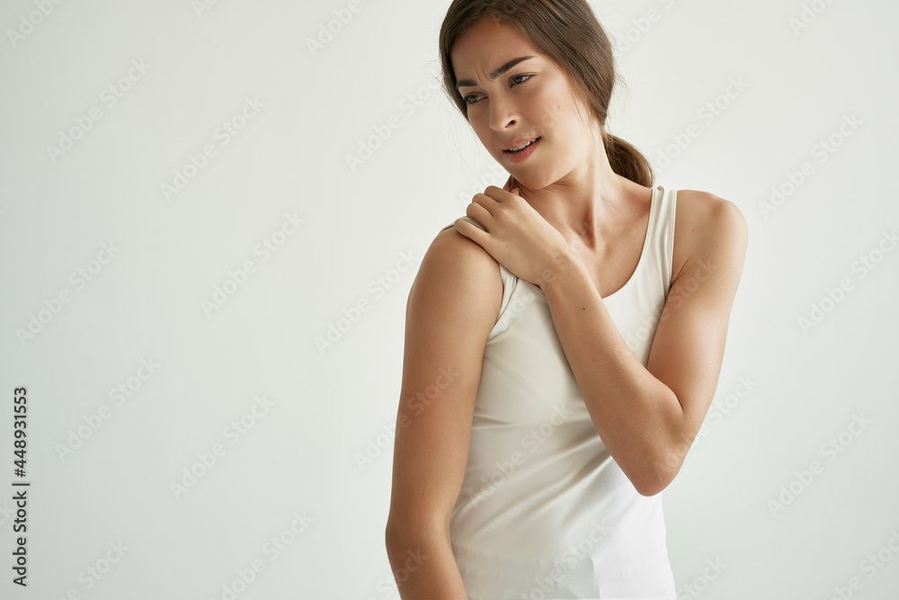 woman holding shoulder health problems massage pain woman holding shoulder health problems massage pain
