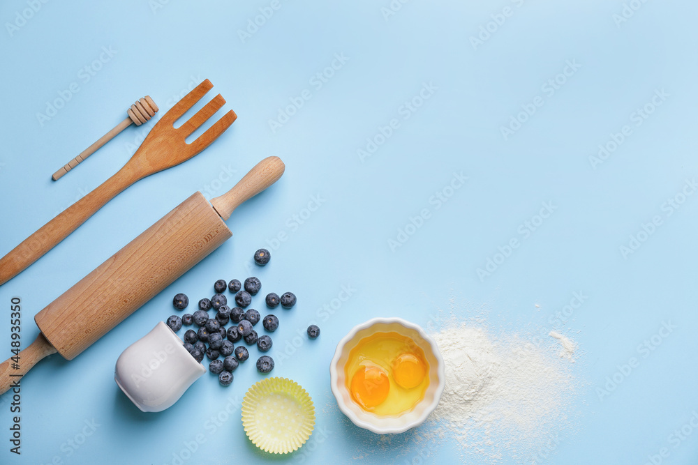 Ingredients for preparing bakery and kitchen utensils on color background Ingredients for preparing bakery and kitchen utensils on color background