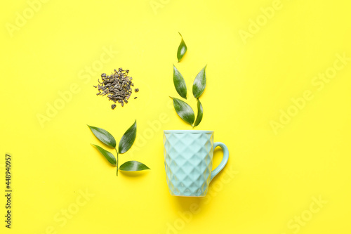 Cup, dry tea and green leav...