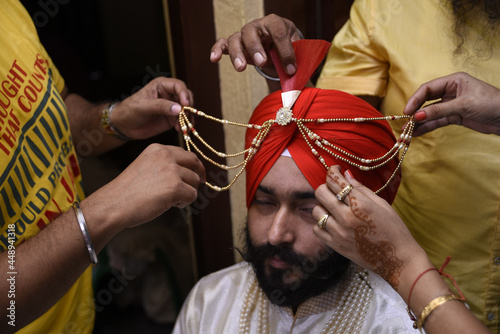 Indian groom wearing turban pagri kolkata india photo