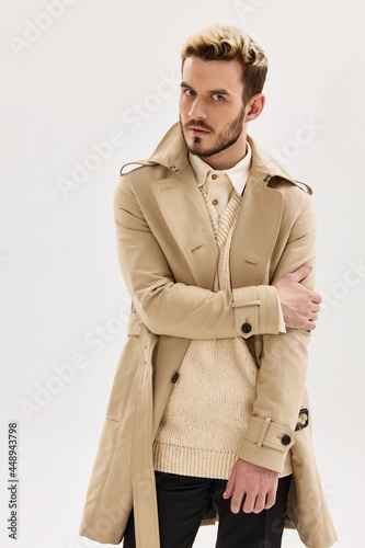 man in coat studio fashion attractive look light background lifestyle
