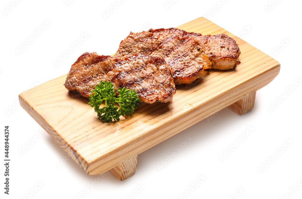 Wooden board with tasty beef steaks on white background Wooden board with tasty beef steaks on white background