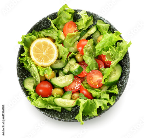 Plate with delicious mixed vegetable salad on white background