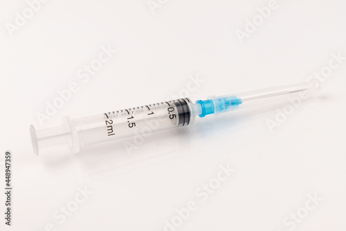 Medical plastic disposable syringe with needle. Applicable for vaccination.