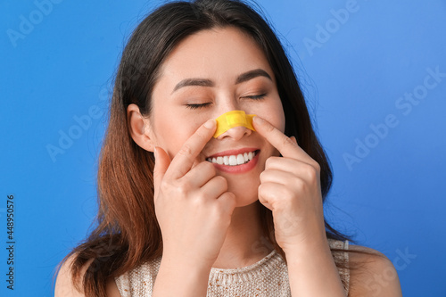 Young Asian woman with appl...